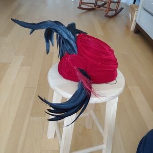 Suzanne Couture red velvet hat with black feathers